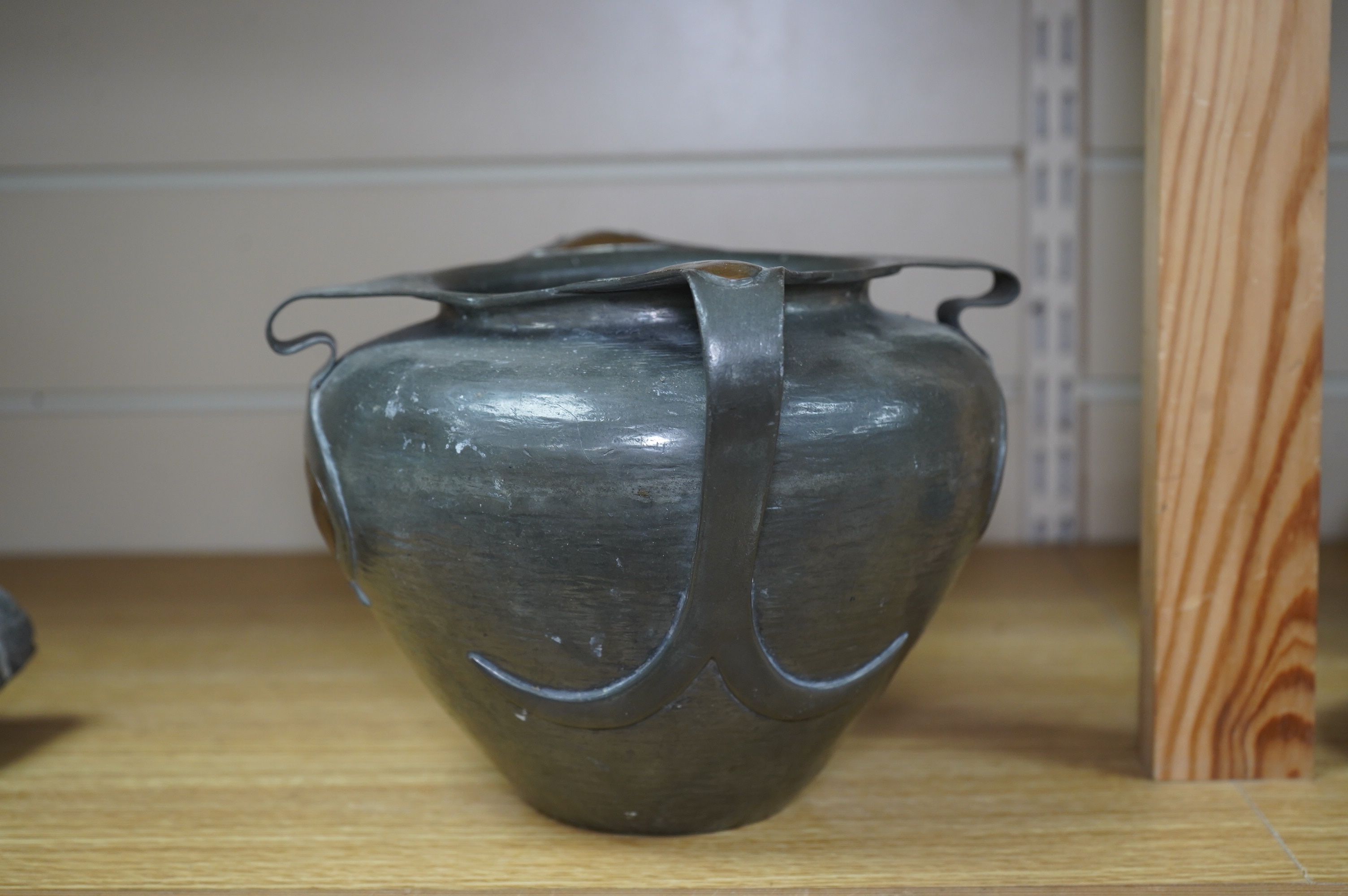 Oliver Baker for Liberty & Co, a Tudric pewter and copper vase, no.0864, c.1910, 25cm wide. Condition - fair to good